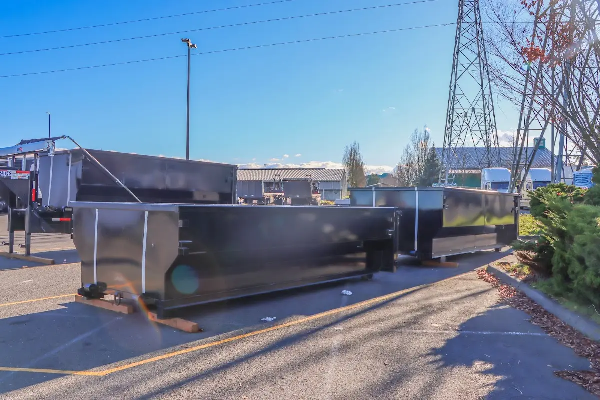 Roll-off dumpster ready for waste disposal at job site for Roll Off Dumpster Rental in Newbury